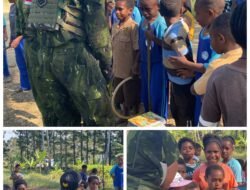 Tingkatkan semangat belajar anak Papua,Prajurit Satgas Pamtas RI-PNG Kewilayahan Yonif 645/GTY Bagikan Alat Tulis untuk Siswa SD Inpres Eragayam